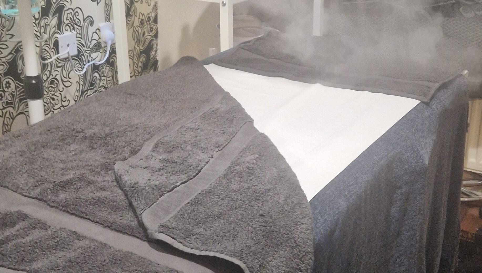 Relaxing steam treatment bed at Smooth n Shine Beautyz, Bradford, England, GB. Perfect for ultimate relaxation.