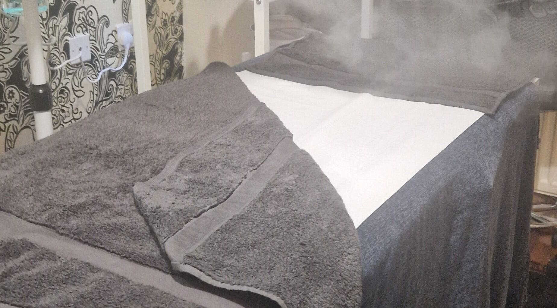 Relaxing steam treatment bed at Smooth n Shine Beautyz, Bradford, England, GB. Perfect for ultimate relaxation.