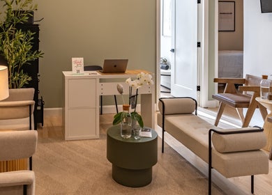 Relaxing lounge at Royal York Holistic Med Spa, Toronto, Ontario, CA, with cozy seating and serene decor.