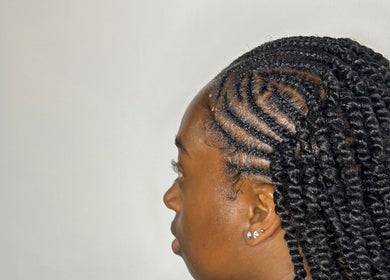 Styled cornrows at Zeehair Salon in Ajax, Ontario, CA. Perfectly braided hair for a sophisticated look.