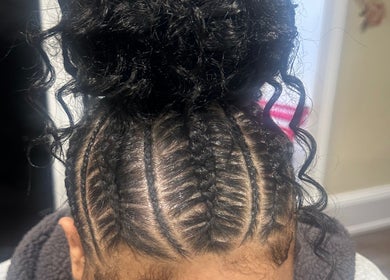 Intricate braids styled at Zeehair Salon in Ajax, Ontario, CA, showcasing expert hair design.