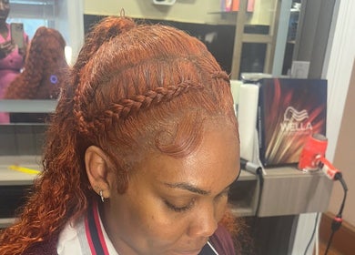 Intricate braided hairstyle at Zeehair Salon, Ajax, Ontario, CA, showcasing expert styling and vibrant colors.