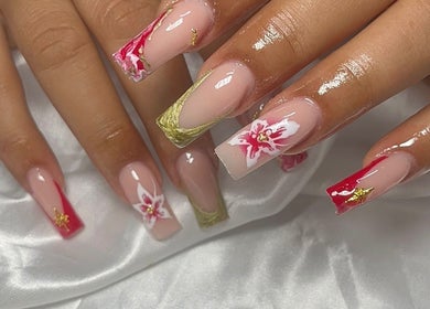Elegant floral nail art at Nails by Frankie, Chicago, Illinois, US. Red and gold accents on a satin background.