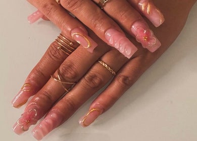 Exquisite pink nail art with gold accents at Nails by Frankie, Chicago, Illinois, US.