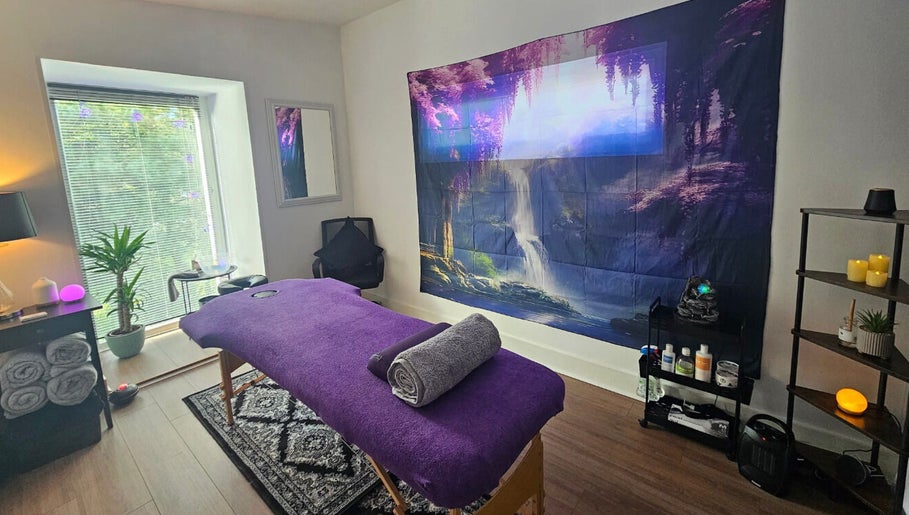 A serene therapy room with a massage table at Rejuvenating Therapies, Bangor, Northern Ireland, GB.
