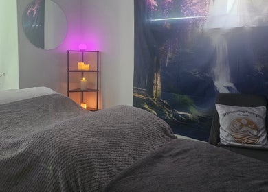 Relaxing therapy room at Rejuvenating Therapies, Bangor, Northern Ireland, GB with soft lighting and calming decor.