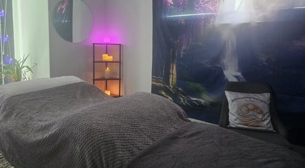 Relaxing therapy room at Rejuvenating Therapies, Bangor, Northern Ireland, GB with soft lighting and calming decor.
