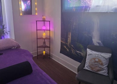 Cozy and serene therapy room at Rejuvenating Therapies, Bangor, Northern Ireland, GB with warm lighting.