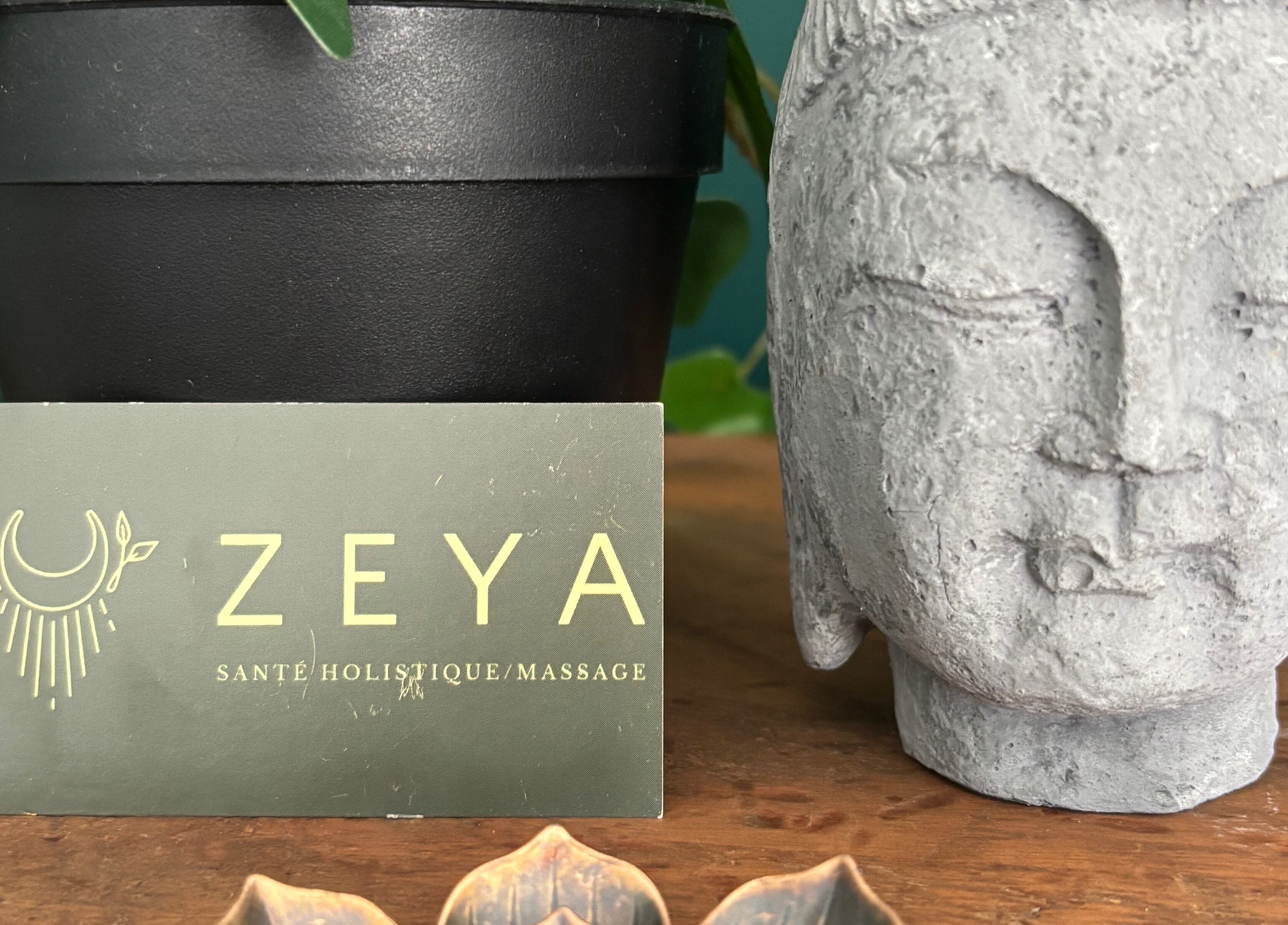 Zeya massage card and Buddha statue at Aylmer / Plateau, Gatineau, Québec, CA enhancing tranquility.