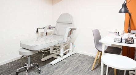 Treatment room at Maria Benitez Nails Studio, Camperdown, New South Wales, AU with massage chair and nail desk.