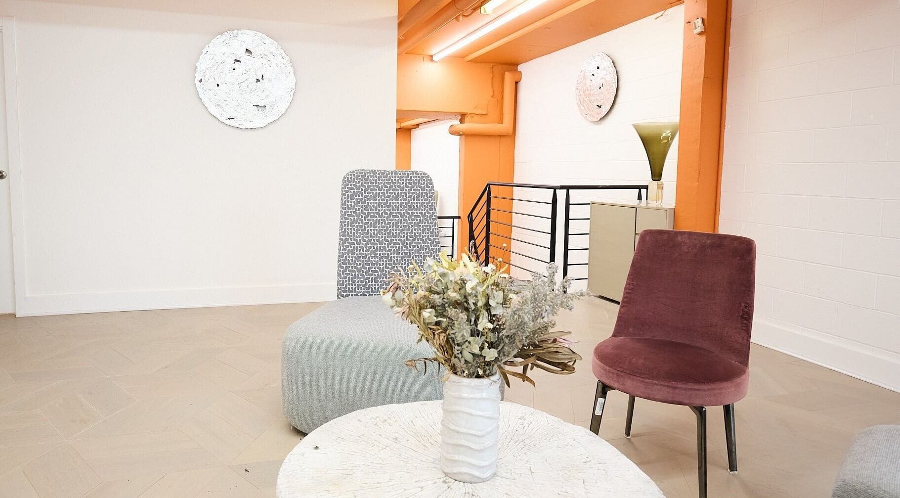 Stylish seating area at Maria Benitez Nails Studio, Camperdown, New South Wales, AU with modern chairs and decor.