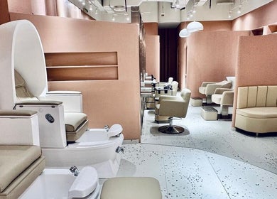 Luxurious interior of The Muse Beauty Space, Dubai, Dubai, AE, showcasing elegant seating and tranquil ambiance.