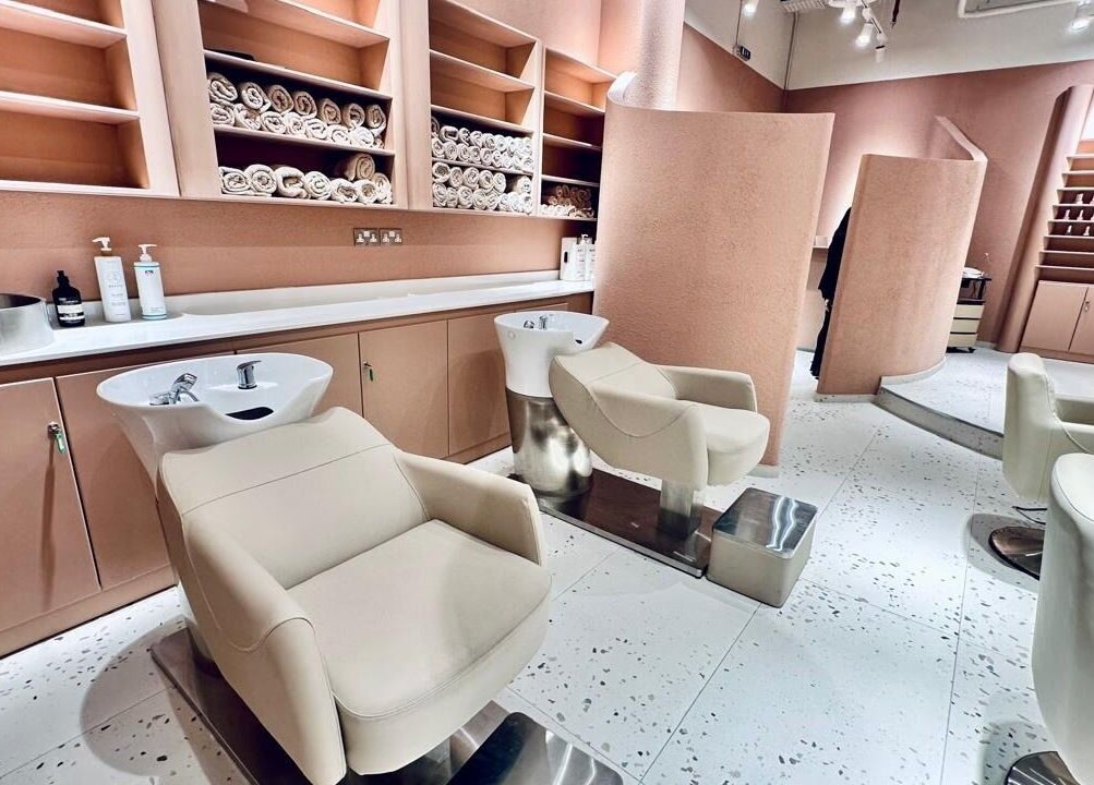 Elegant salon chairs at The Muse Beauty Space, Dubai, Dubai, AE offering a luxurious hair treatment experience.