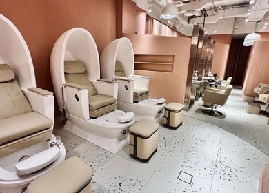 Luxurious pedicure chairs at The Muse Beauty Space, Dubai, Dubai, AE offer comfort and style.