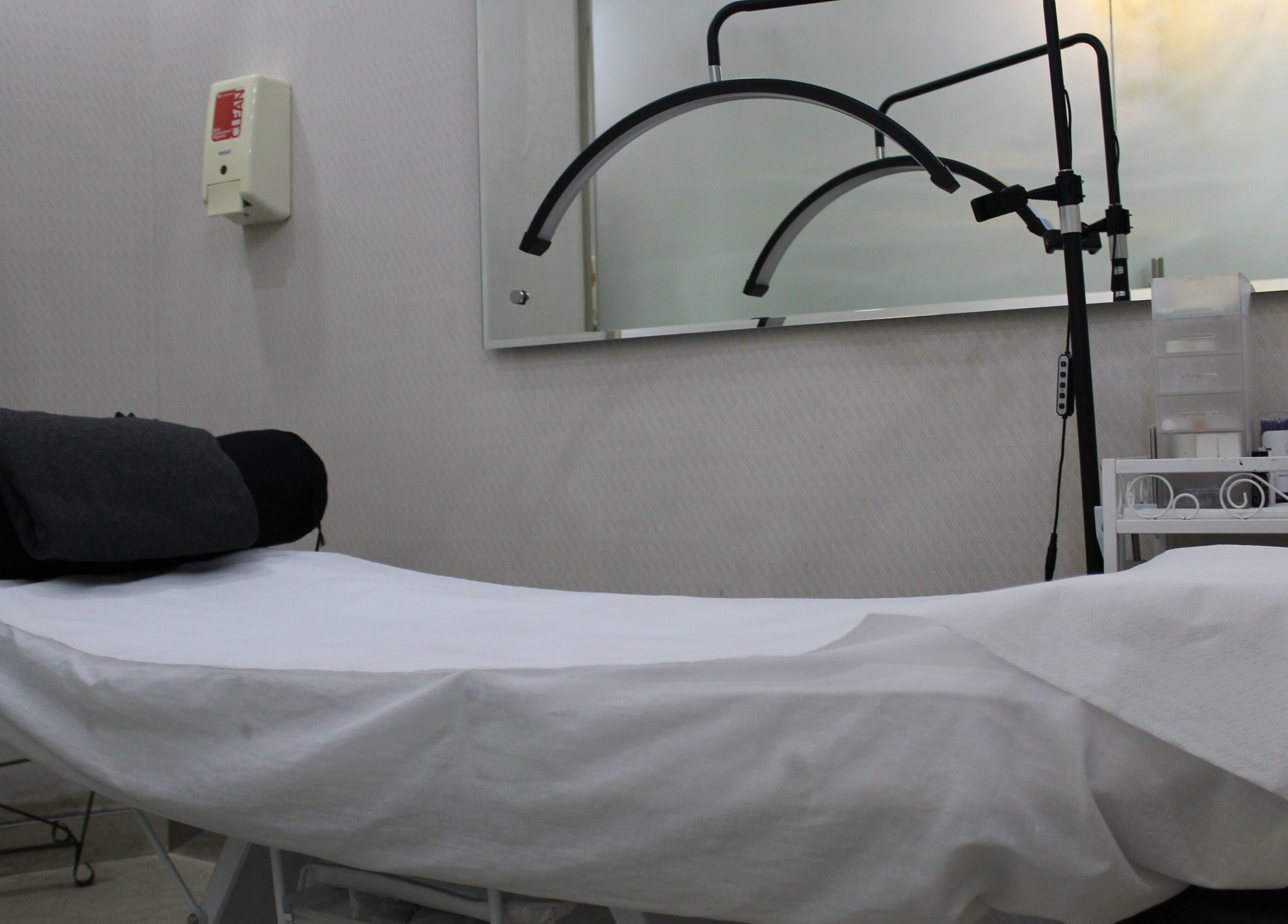 Treatment bed at Eyelash Extension Center, Souk Qariyat Al Beri, Abu Dhabi, Abu Dhabi, AE, ready for relaxation.