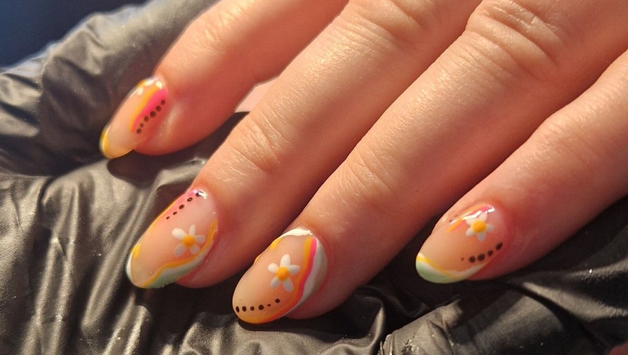 Floral nail art showcasing vibrant designs at Chloe's in Woodville, England, GB.