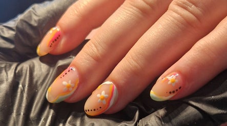 Floral nail art showcasing vibrant designs at Chloe's in Woodville, England, GB.