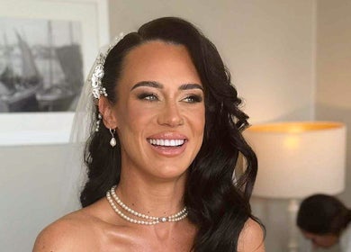 Smiling bride with elegant jewelry at Anais in Sutton-in-ashfield, England, GB.