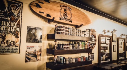 FIGARO BARBERSHOP LEUCADIA in Encinitas, California, features a vintage decor with surfboard and grooming products.