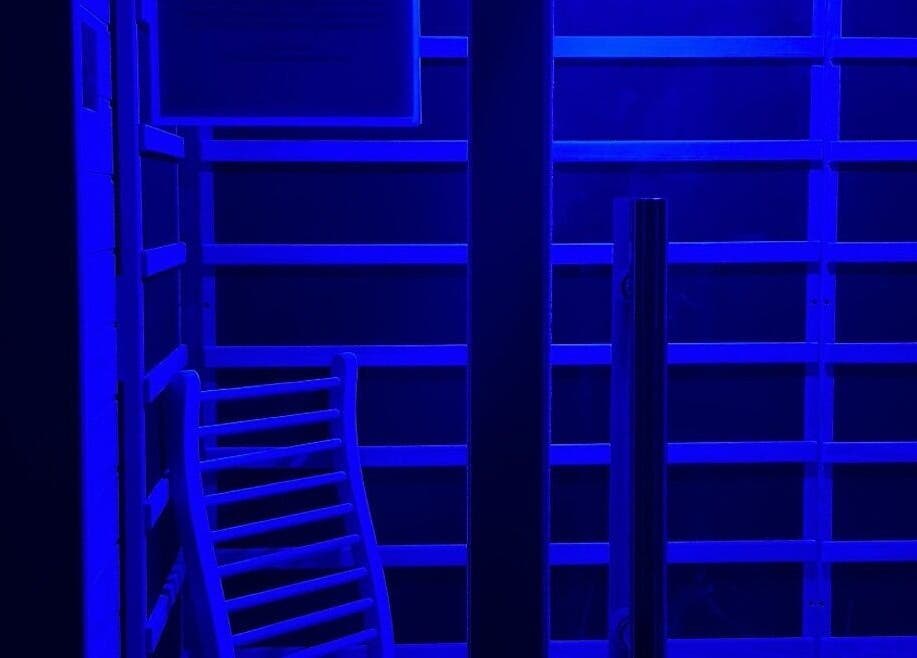 Relaxing blue-lit room at Recover by Heat Retreat, Mount Maunganui, Bay Of Plenty Region, NZ for ultimate wellness.