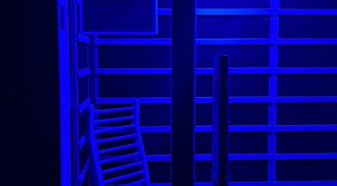 Relaxing blue-lit room at Recover by Heat Retreat, Mount Maunganui, Bay Of Plenty Region, NZ for ultimate wellness.