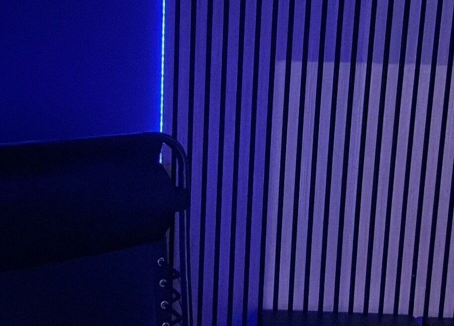 Relaxing room with ambient blue lighting at Recover by Heat Retreat, Mount Maunganui, Bay Of Plenty Region, NZ.