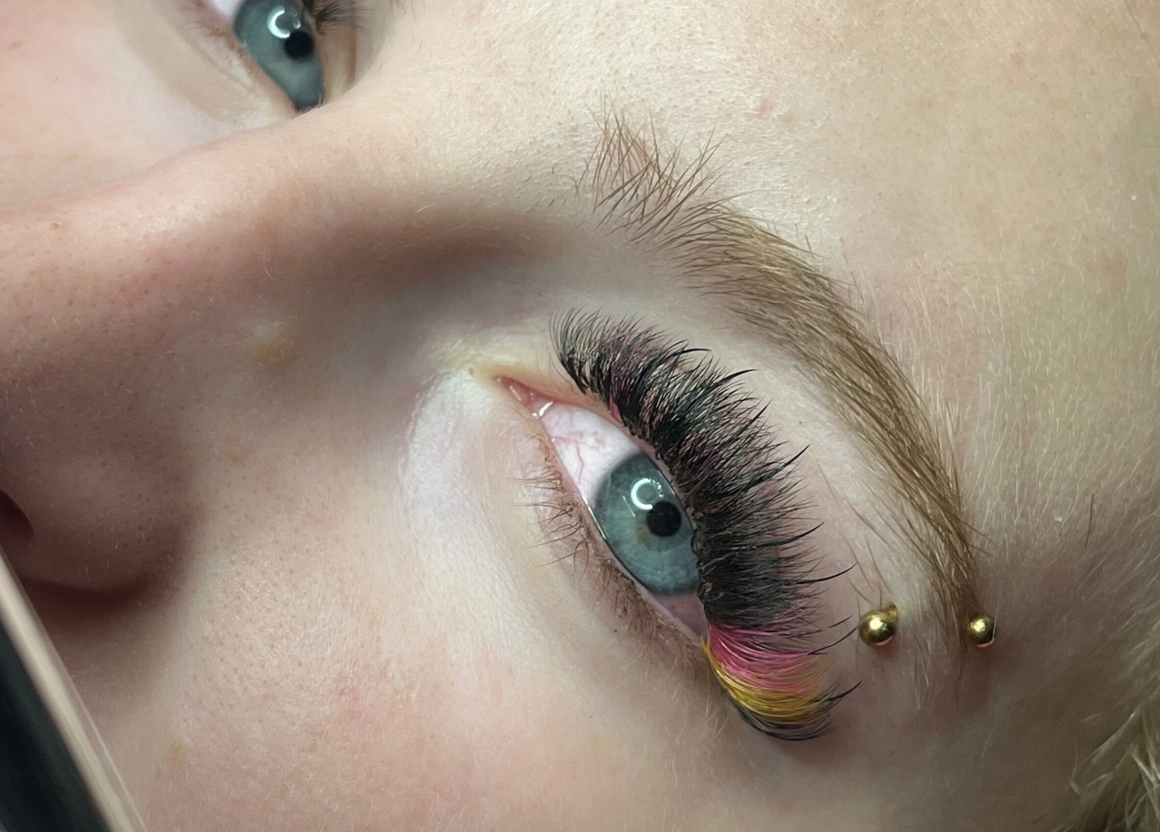 Close-up of colorful eyelash extensions at Angel Eyes Beauty By Arien, Halls Head, Western Australia, AU.