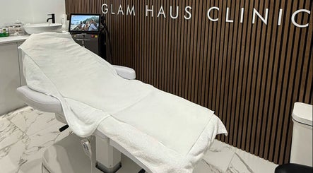 A serene treatment room at Glam Haus Clinic in Coventry, England, featuring a luxurious spa chair.
