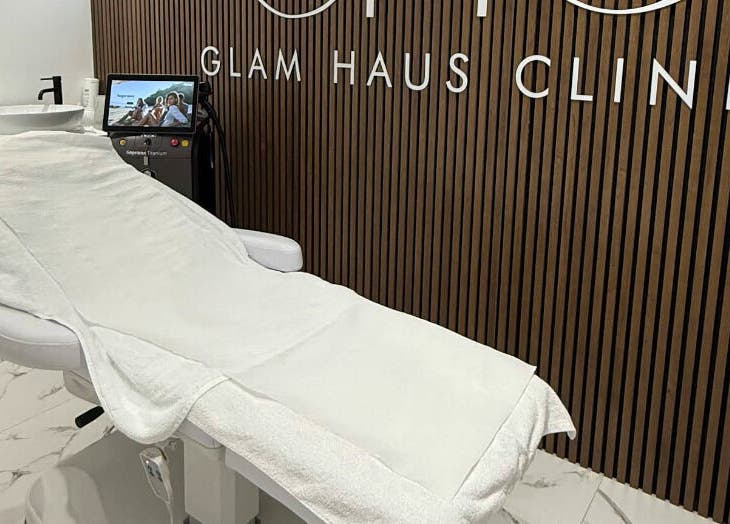 Serene treatment room at Glam Haus Clinic in Coventry, England, GB with modern aesthetics equipment.
