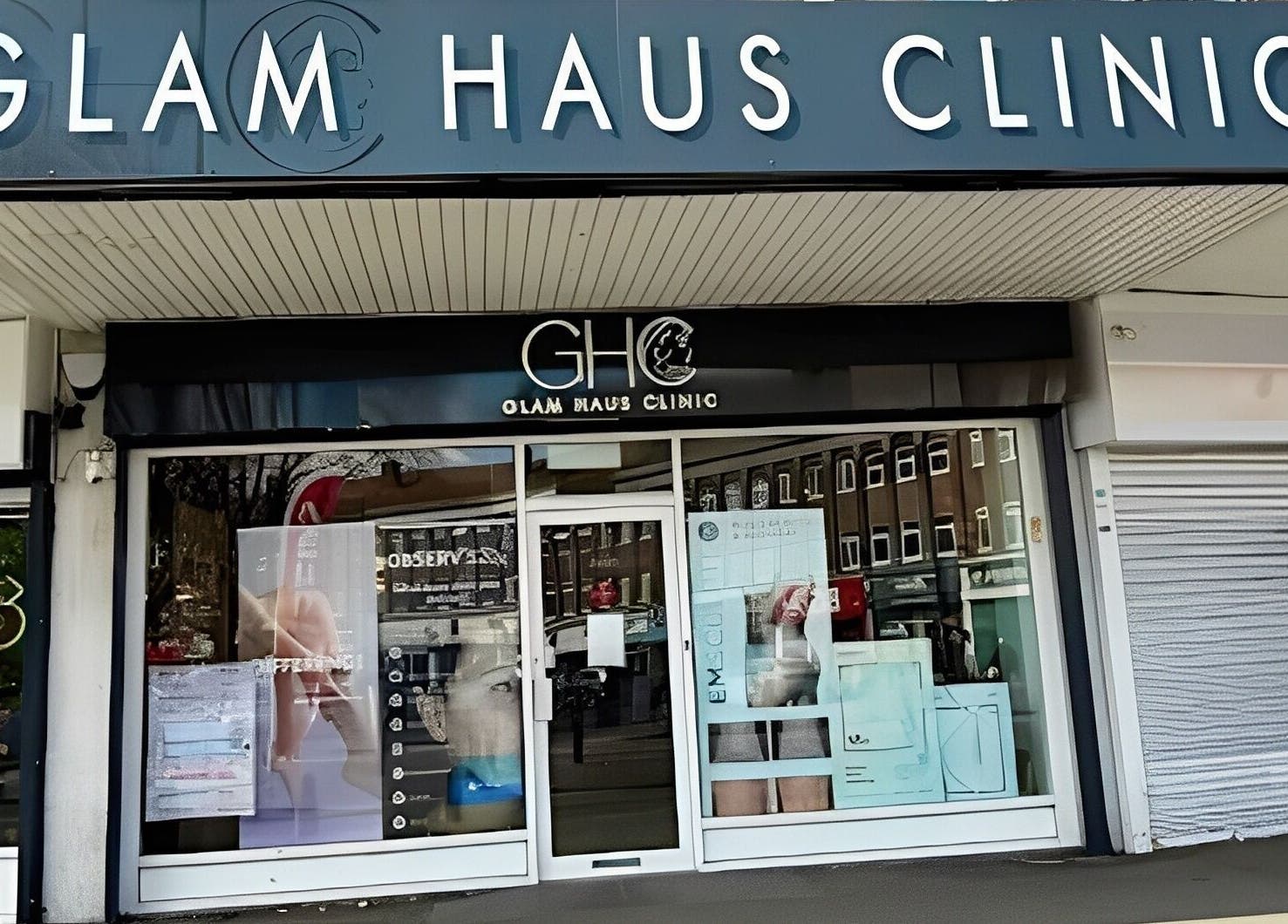 Exterior of Glam Haus Clinic in Coventry, England, GB, featuring stylish signage and glass-fronted entry.