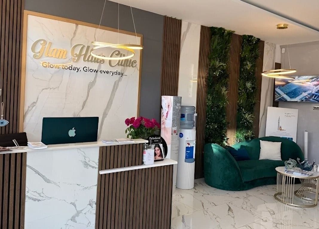 Elegant reception at Glam Haus Clinic, Coventry, England featuring modern decor and plush seating.