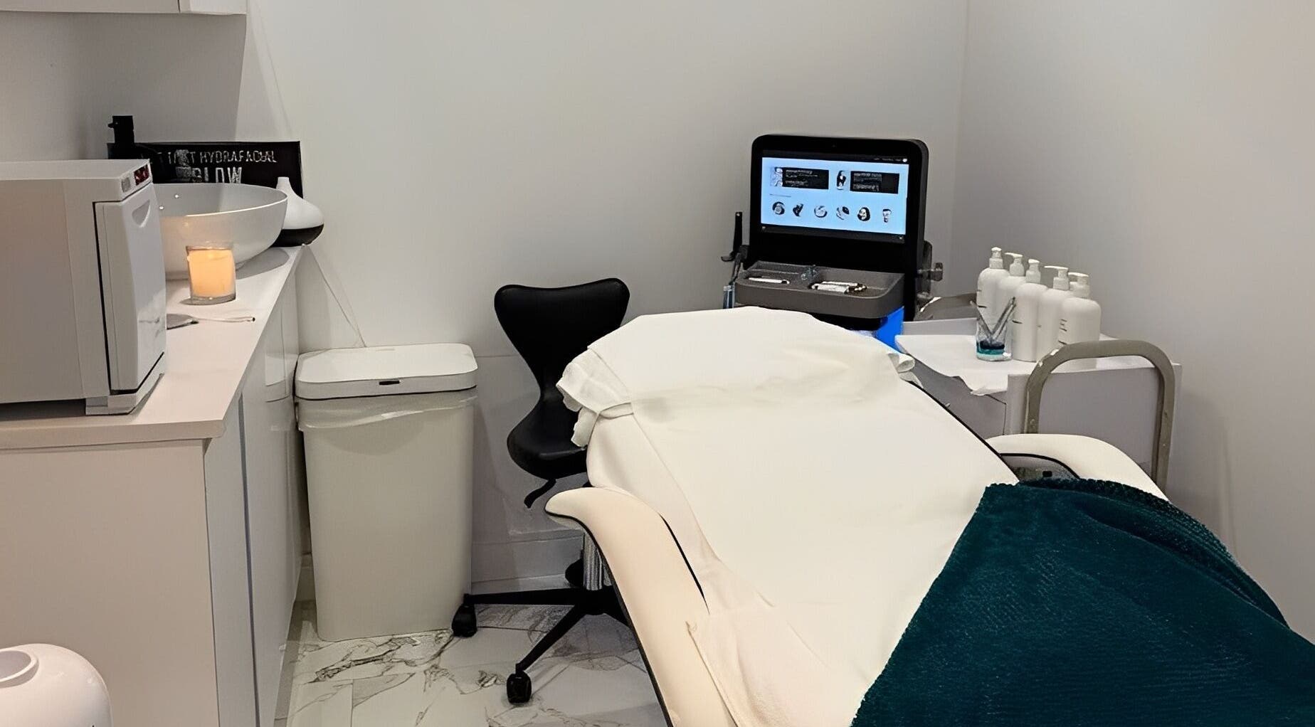 Elegant treatment room at Glam Haus Clinic, Coventry, England. Relaxing ambiance with modern equipment.