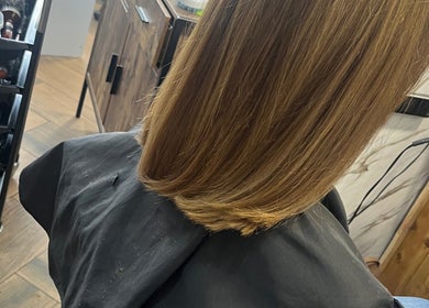 Sleek bob haircut at Hairbycjay in Leigh, England, GB, showcasing precision and shine.