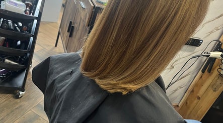 Sleek bob haircut at Hairbycjay in Leigh, England, GB, showcasing precision and shine.