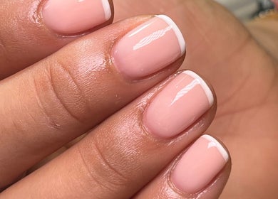 Close-up of French manicured nails at Beauty by Freya Elise, Leatherhead, England, GB.