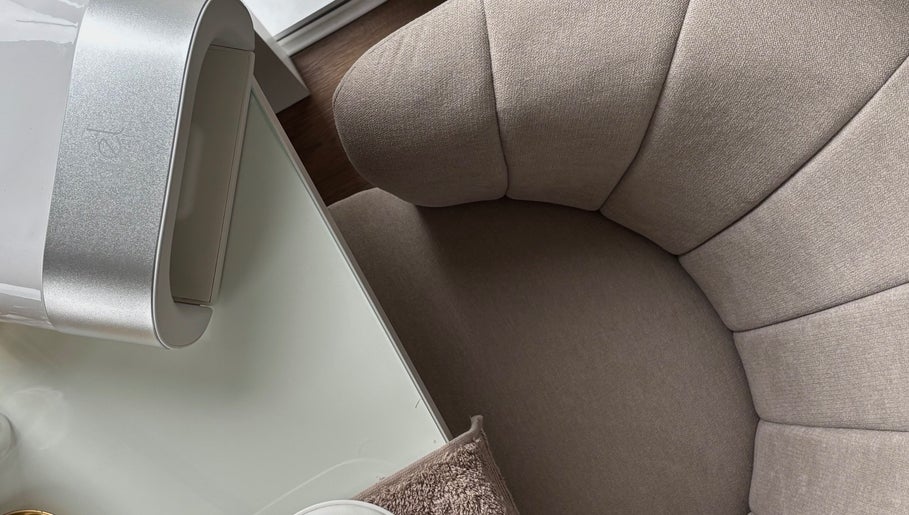 Elegant beauty setup with plush chair at CLN Cosmetics, Newport, Wales, GB.