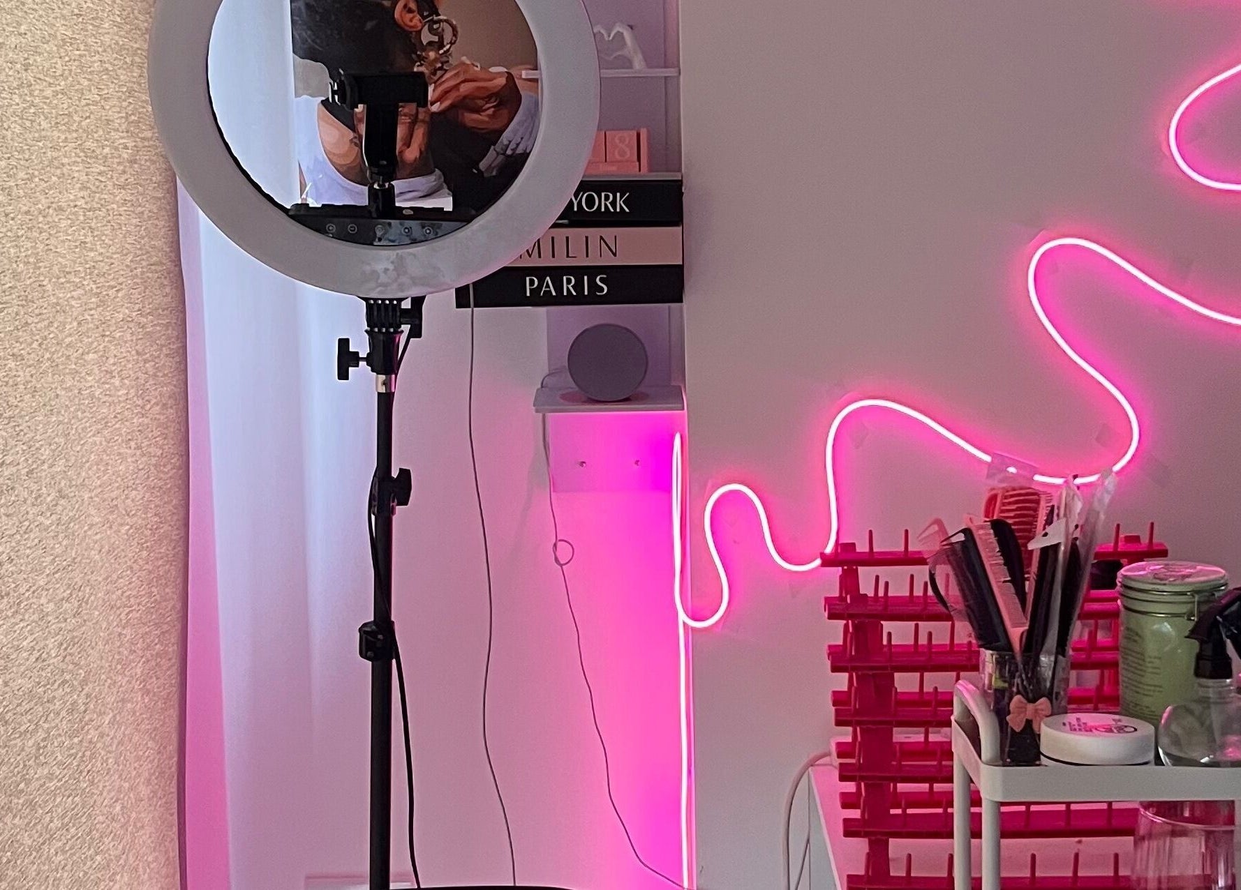 Adorned by Jay studio with neon lights and beauty tools in Birmingham, England, GB.