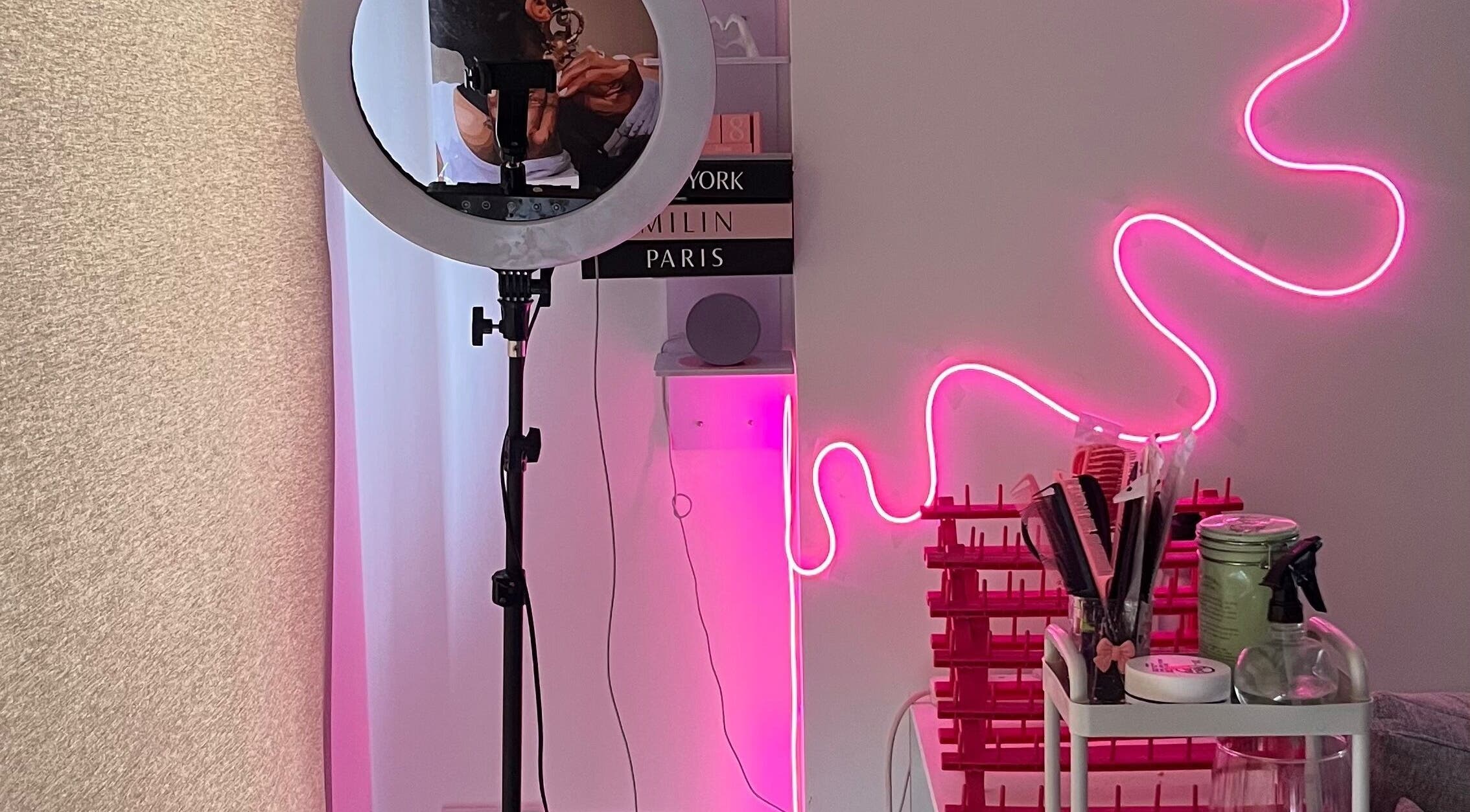 Adorned by Jay studio with neon lights and beauty tools in Birmingham, England, GB.