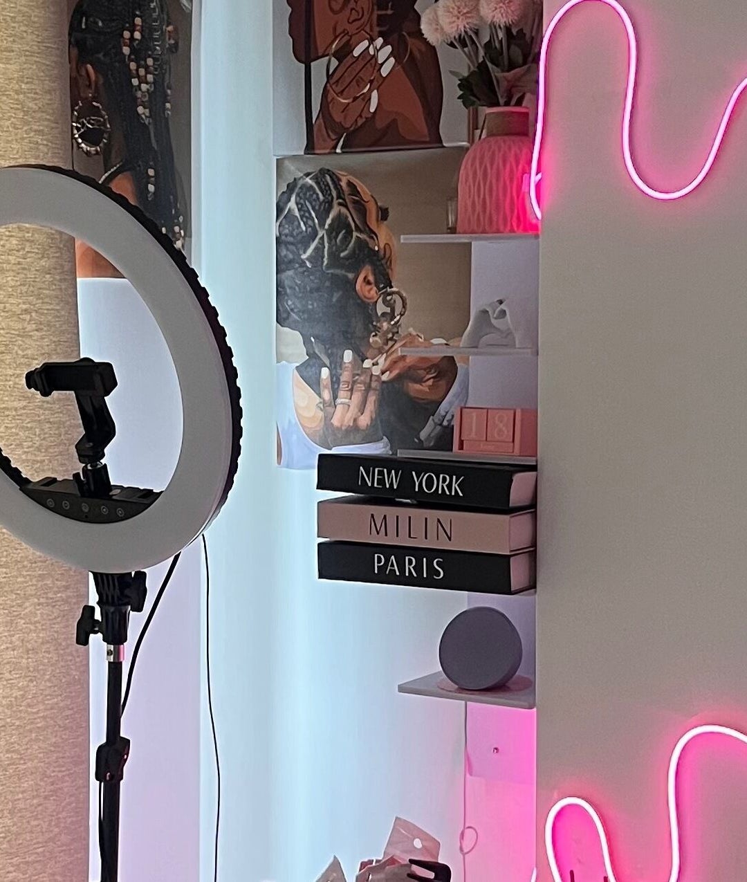 Modern, vibrant beauty setup at Adorned by Jay, Birmingham, England, GB with neon lights and ring light.