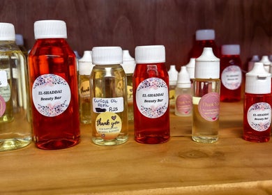 Vibrant oils at El Shaddai Beauty Bar, Cape Town, Western Cape, ZA. Essential care products showcase.