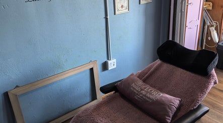 Cozy treatment area at El Shaddai Beauty Bar, Cape Town, Western Cape, ZA, featuring a plush bed and decor.