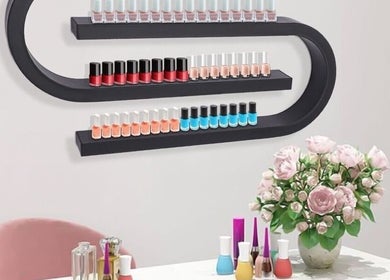 Nail polish showcase at Vivid Nails Studio, St. Michael, Saint James, BB with floral decor.