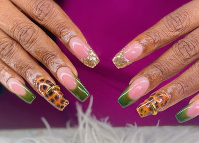 Stylish nail design at Vivid Nails Studio, St. Michael, Saint James, BB featuring green tips and gold accents.