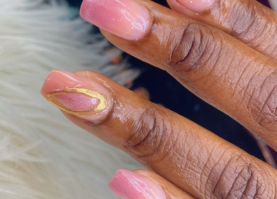 Elegant pink nail design with gold accents at Vivid Nails Studio, St. Michael, Saint James, BB.