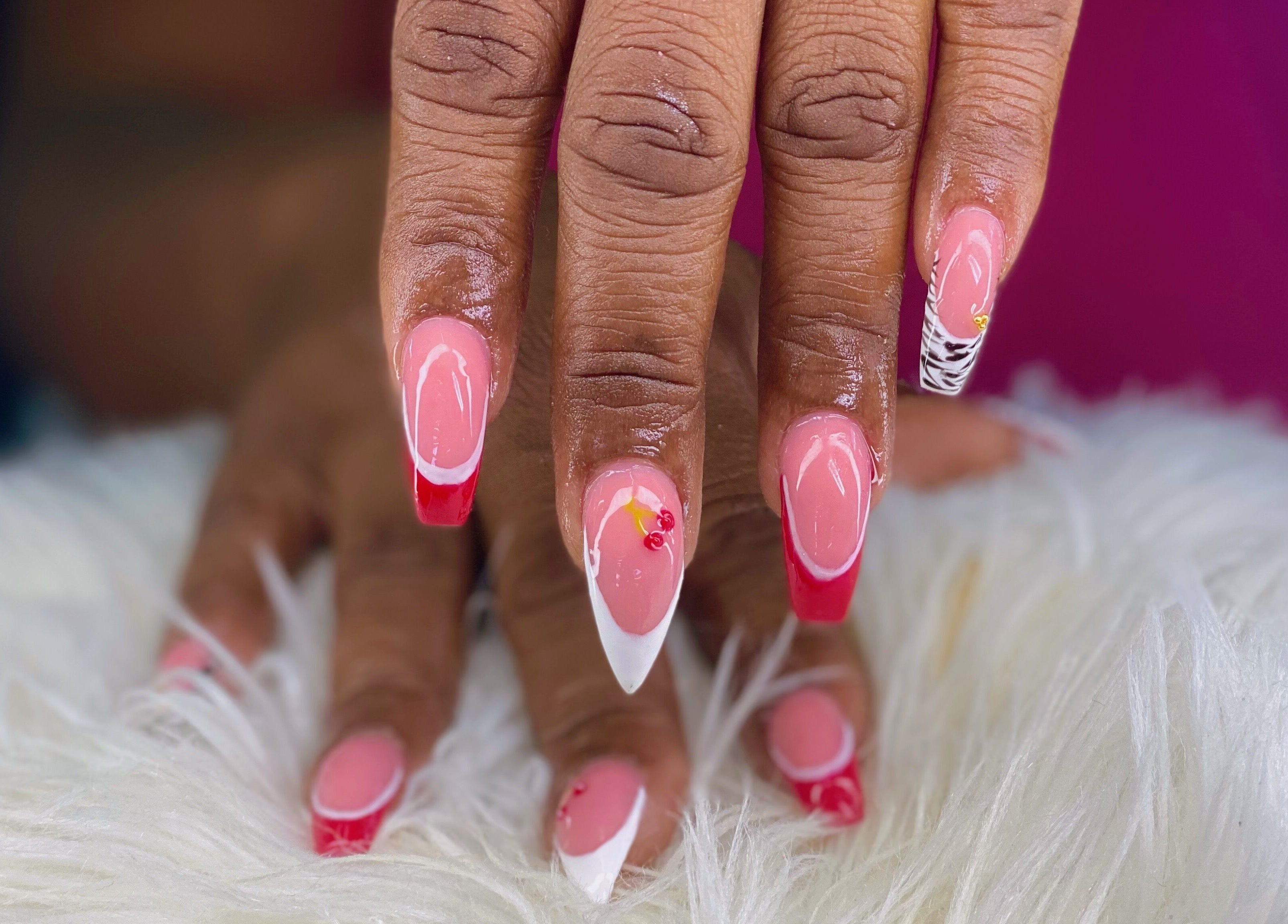 Stylish pink and red manicure at Vivid Nails Studio, St. Michael, Saint James, BB.
