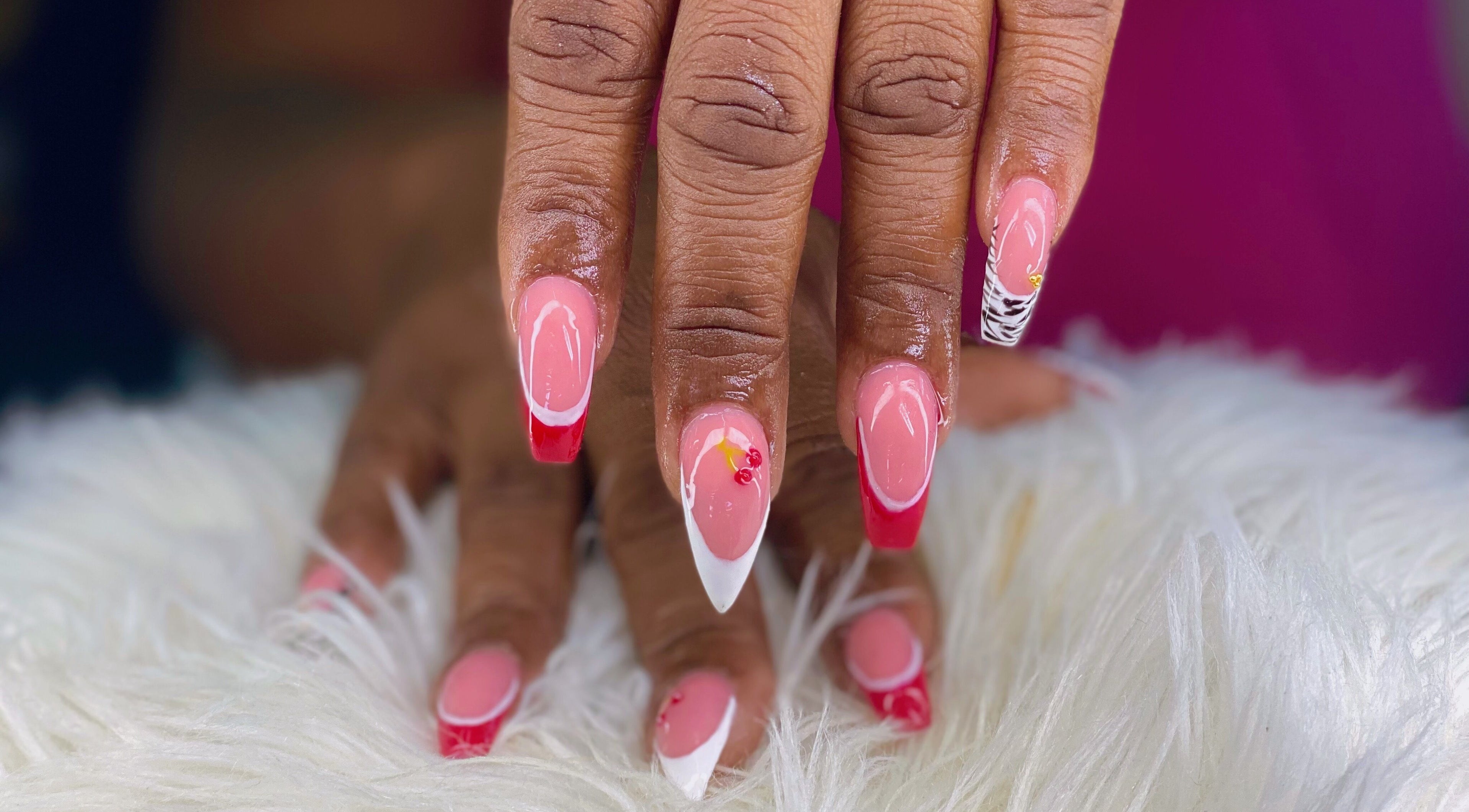 Stylish pink and red manicure at Vivid Nails Studio, St. Michael, Saint James, BB.