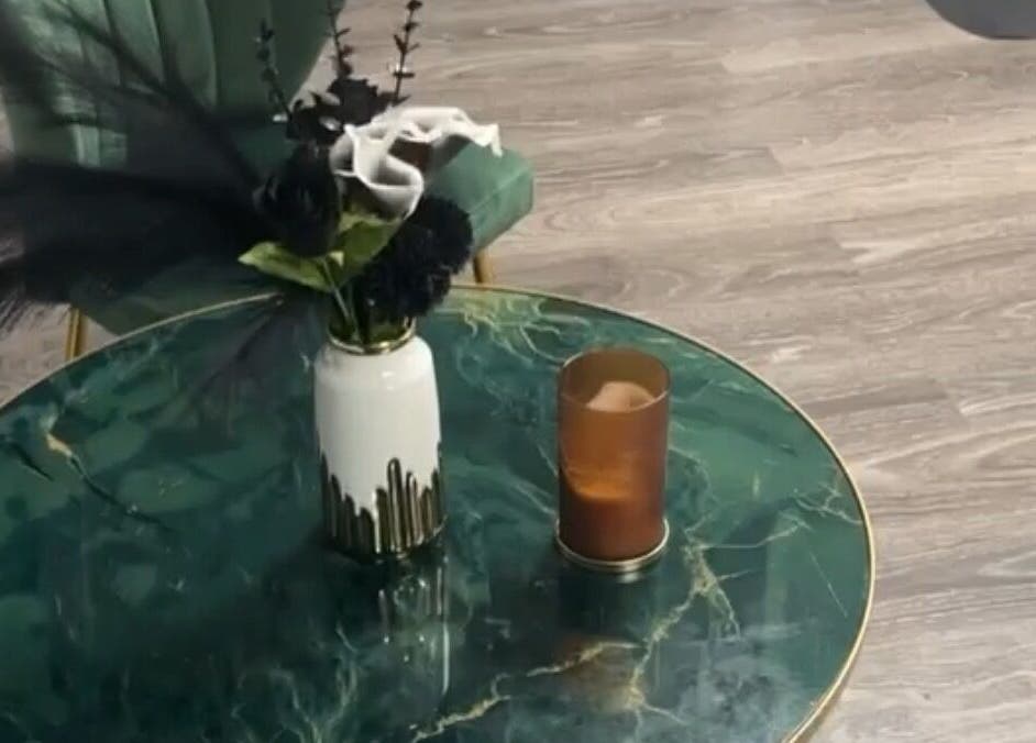 Marble table with vase at Beyond Beauty & Spa LLC, Royal Palm Beach, Florida, US.