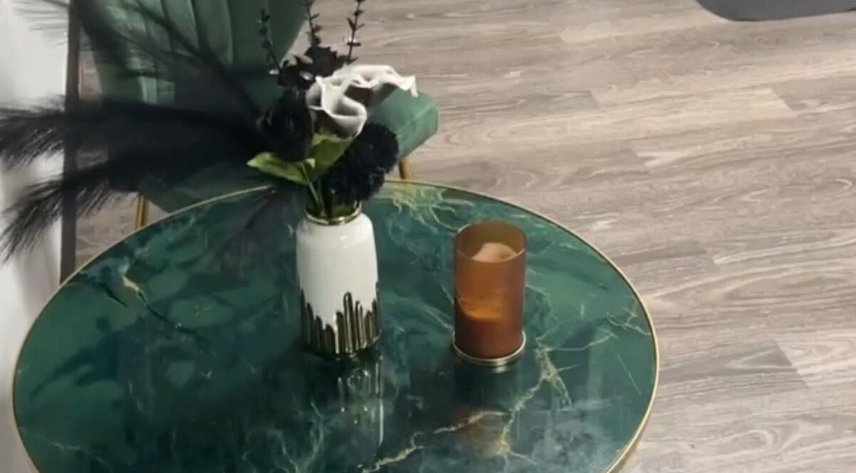 Marble table with vase at Beyond Beauty & Spa LLC, Royal Palm Beach, Florida, US.