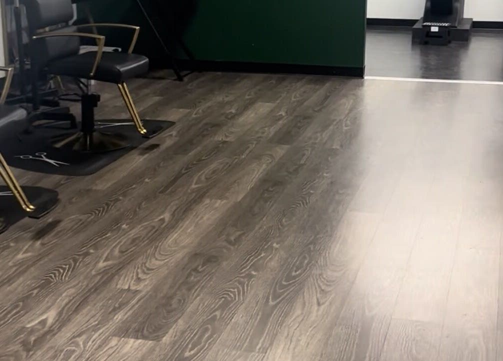 Chic salon chairs on wooden flooring at Beyond Beauty & Spa LLC, Royal Palm Beach, Florida, US.