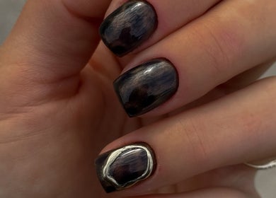Close-up of stylish dark nails with metallic accent from Katzby Nail Artistry in Canning Vale, Western Australia, AU.